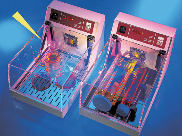 Openings- en sluitingsmechanismen voor beschermkappen in mi...